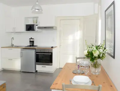 Cuisine ou kitchenette dans l'établissement La corderie du Lude