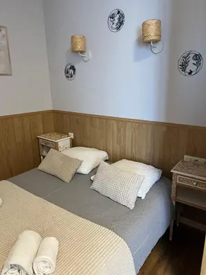 Un ou plusieurs lits dans un hébergement de l'établissement Hôtel Les Quais