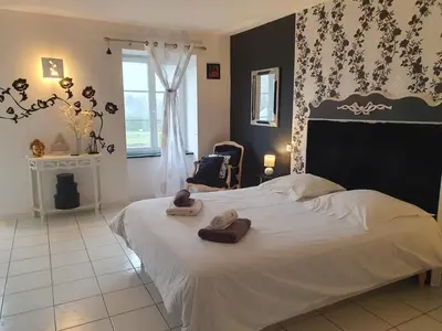 Un ou plusieurs lits dans un hébergement de l'établissement Chambres du logis De La Mare Du Parc