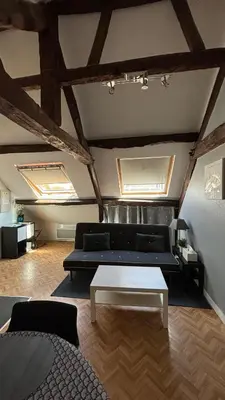 Coin salon dans l'établissement Au cœur du centre historique
