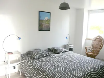 Un ou plusieurs lits dans un hébergement de l'établissement Villa en campagne au Locheur + Piscine