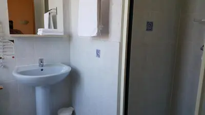 Salle de bains dans l'établissement Hotel La Renaissance