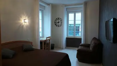 Télévision ou salle de divertissement dans l'établissement Hotel La Renaissance