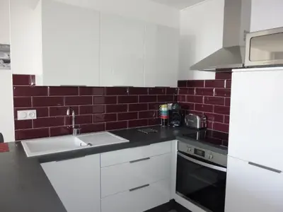 Cuisine ou kitchenette dans l'établissement Gîte 