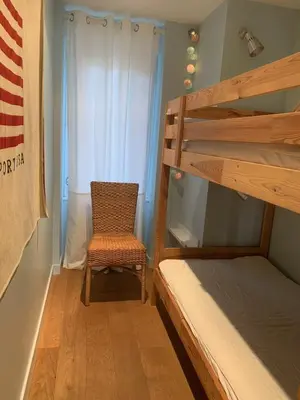 Un ou plusieurs lits dans un hébergement de l'établissement vue sur mer