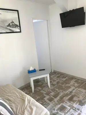 Télévision ou salle de divertissement dans l'établissement Gîte La Croix La grise