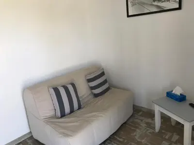 Coin salon dans l'établissement Gîte La Croix La grise