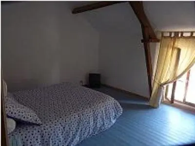 Un ou plusieurs lits dans un hébergement de l'établissement La Ferme de la Petite Noé