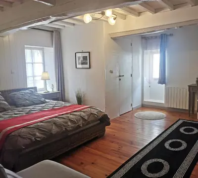 Un ou plusieurs lits dans un hébergement de l'établissement Villa Athéna,séjour bien-être et éthique
