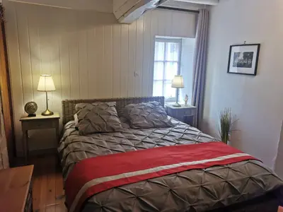 Un ou plusieurs lits dans un hébergement de l'établissement Villa Athéna,séjour bien-être et éthique