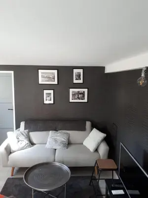 Coin salon dans l'établissement Le cosy plage
