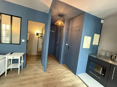 Cuisine ou kitchenette dans l'établissement Appart Hôtel de la baie
