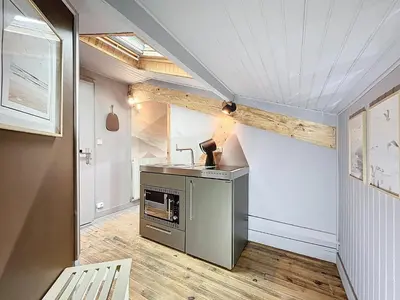 Cuisine ou kitchenette dans l'établissement Appart Hôtel de la baie