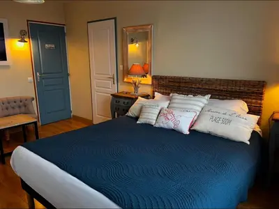 Un ou plusieurs lits dans un hébergement de l'établissement Les Transats Chambre et appartements Face à la mer