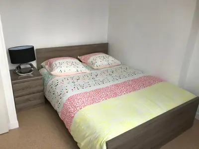 Un ou plusieurs lits dans un hébergement de l'établissement Appartement Rue Victor Hugo - Port de la Houle