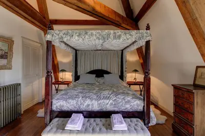 Un ou plusieurs lits dans un hébergement de l'établissement Château de Tocqueville