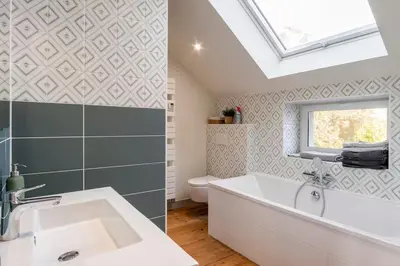 Salle de bains dans l'établissement Le Cottage De La Baie