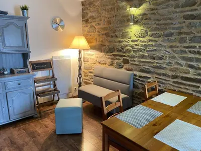 Coin salon dans l'établissement Le Relais de la Hardiesse 6km Mont St Michel - Chambres d'hôtes et gites