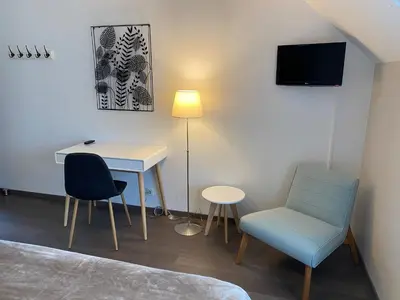 Télévision ou salle de divertissement dans l'établissement Le Relais de la Hardiesse 6km Mont St Michel - Chambres d'hôtes et gites