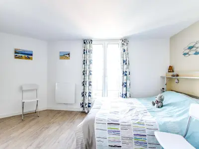 Un ou plusieurs lits dans un hébergement de l'établissement Apartment Port Guillaume-15 by Interhome