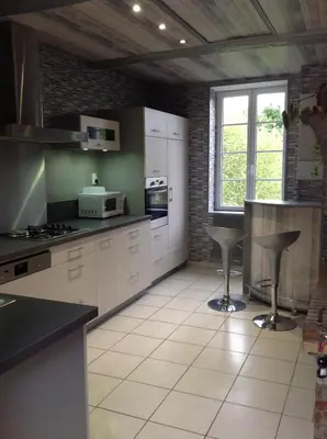 Cuisine ou kitchenette dans l'établissement L' ancien pressoir 2