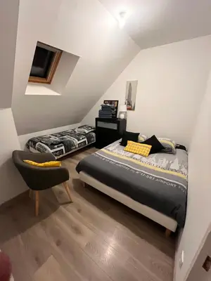 Un ou plusieurs lits dans un hébergement de l'établissement Gite 5 pers avec 2h espace bien-être privatisé inclus dans le prix de la nuit 80m2 de détente