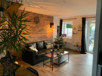 Coin salon dans l'établissement Gite 5 pers avec 2h espace bien-être privatisé inclus dans le prix de la nuit 80m2 de détente