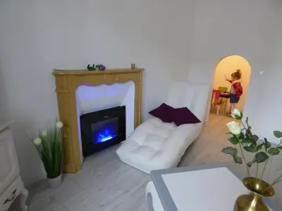 Télévision ou salle de divertissement dans l'établissement Gite 7 km du Mont St Michel