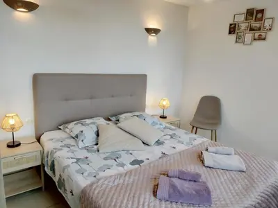Un ou plusieurs lits dans un hébergement de l'établissement Gîte La Buhennerie 2 personnes