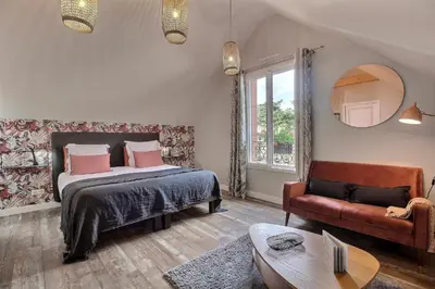 Un ou plusieurs lits dans un hébergement de l'établissement La Cotentine Maison d'Hôtes