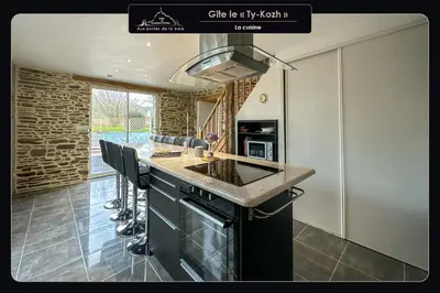 Cuisine ou kitchenette dans l'établissement Aux portes de la baie - Vieux-Viel