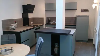 Cuisine ou kitchenette dans l'établissement Le 4