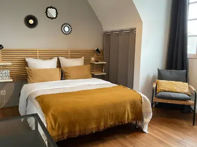 Un ou plusieurs lits dans un hébergement de l'établissement Appartement cosy bord de mer