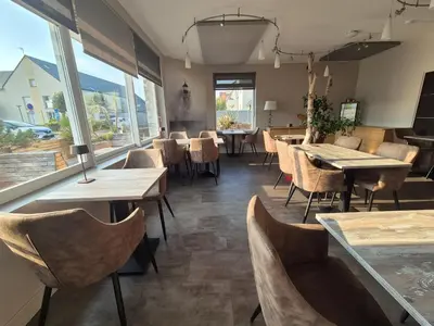 Coin salon dans l'établissement Cit'Hotel La Villa Julia