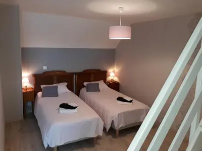 Un ou plusieurs lits dans un hébergement de l'établissement Relais de la Liberte - Utah Beach