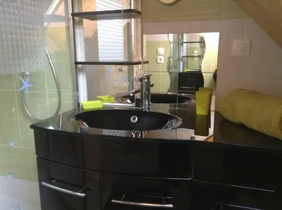 Salle de bains dans l'établissement Chez MARLENE