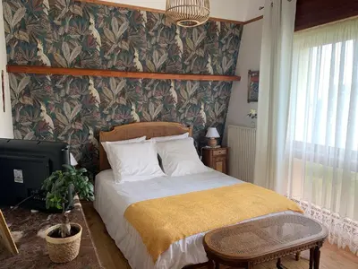 Un ou plusieurs lits dans un hébergement de l'établissement chambre normande