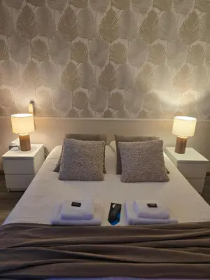 Un ou plusieurs lits dans un hébergement de l'établissement Hôtel L'ideal le Mountbatten