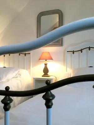 Un ou plusieurs lits dans un hébergement de l'établissement Clos de Bellefontaine B&B