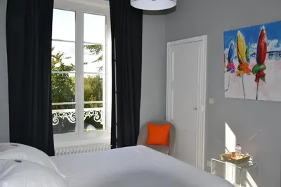 Un ou plusieurs lits dans un hébergement de l'établissement Clos de Bellefontaine B&B