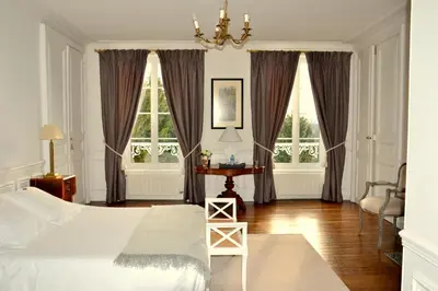 Un ou plusieurs lits dans un hébergement de l'établissement Clos de Bellefontaine B&B