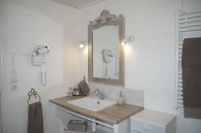 Salle de bains dans l'établissement Les 4 saisons