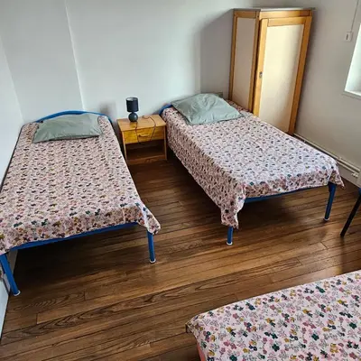 Un ou plusieurs lits dans un hébergement de l'établissement Gîtes de la terrette
