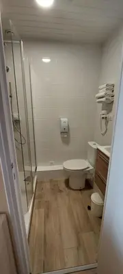 Salle de bains dans l'établissement Hotel Beau Rivage