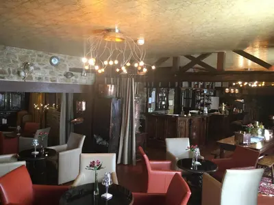 Coin salon dans l'établissement Hôtel de La Croix d'Or