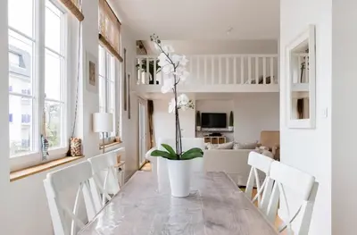Coin salon dans l'établissement Appartement Bien-être 2 chambres au coeur de Cabourg -