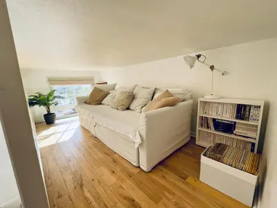 Coin salon dans l'établissement Appartement Bien-être 2 chambres au coeur de Cabourg -