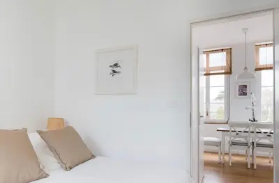 Un ou plusieurs lits dans un hébergement de l'établissement Appartement Bien-être 2 chambres au coeur de Cabourg -