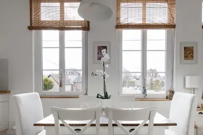 Coin salon dans l'établissement Appartement Bien-être 2 chambres au coeur de Cabourg -
