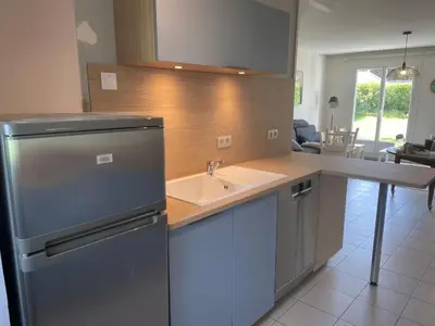 Cuisine ou kitchenette dans l'établissement maison 400 m de la plage